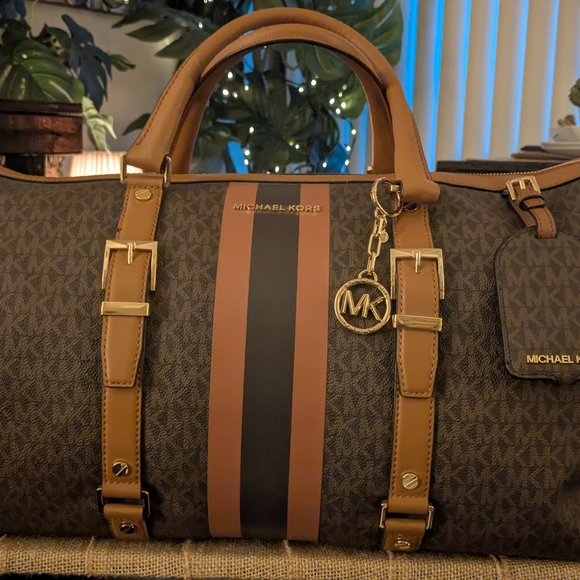 Michael Kors Black and Brown Duffel with Gold Accents. FIRM PRICING.. - Picture 2 of 8